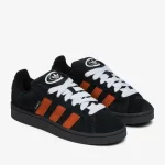 photo des chaussures de skateboard adidas campus 00s carbon orange